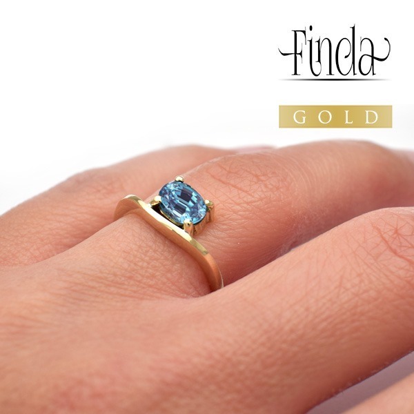 Szellő sárga arany gyűrű kék topázzal Szellő sárga arany gyűrű kék topázzal