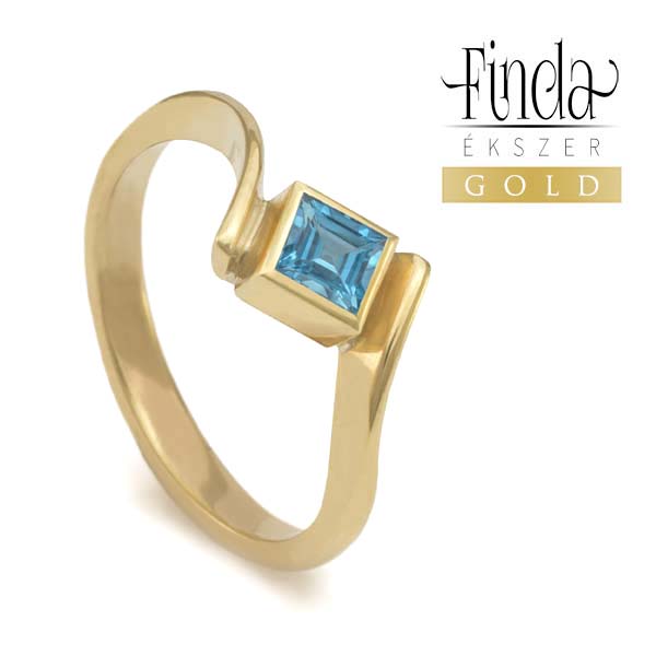 Quadrat sárga arany gyűrű kék topázzal Quadrat sárga arany gyűrű kék topázzal